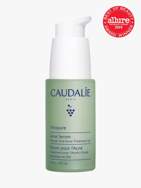 Caudalie Vinopure Acne Serum in branded green bottle with white pump on light gray background with red Allure Best of Beauty seal in the top right corner